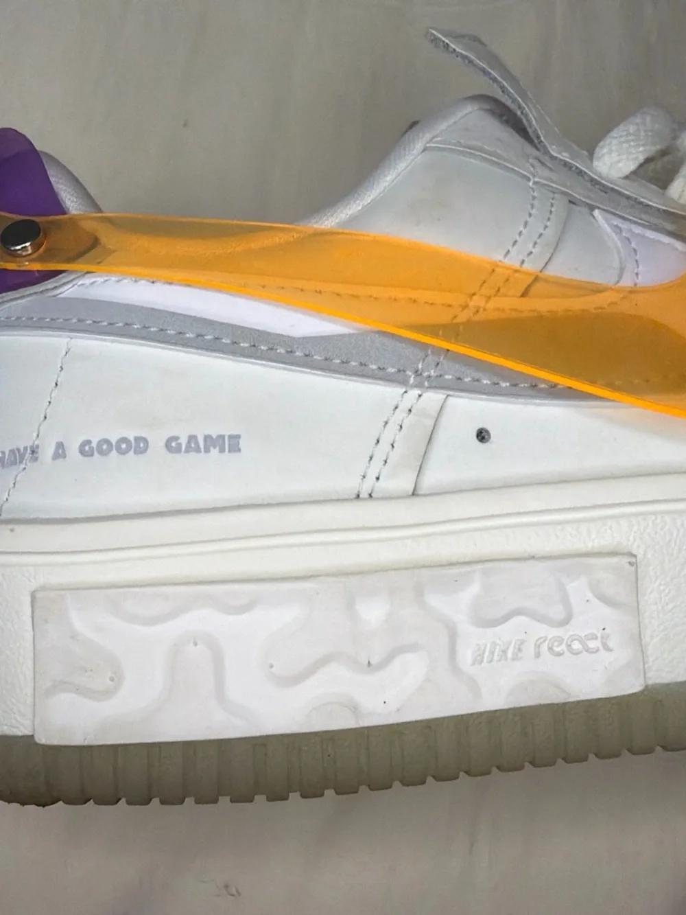 Nike White Sneakers with Neon Pink, Green, Purple, and Orange Accents